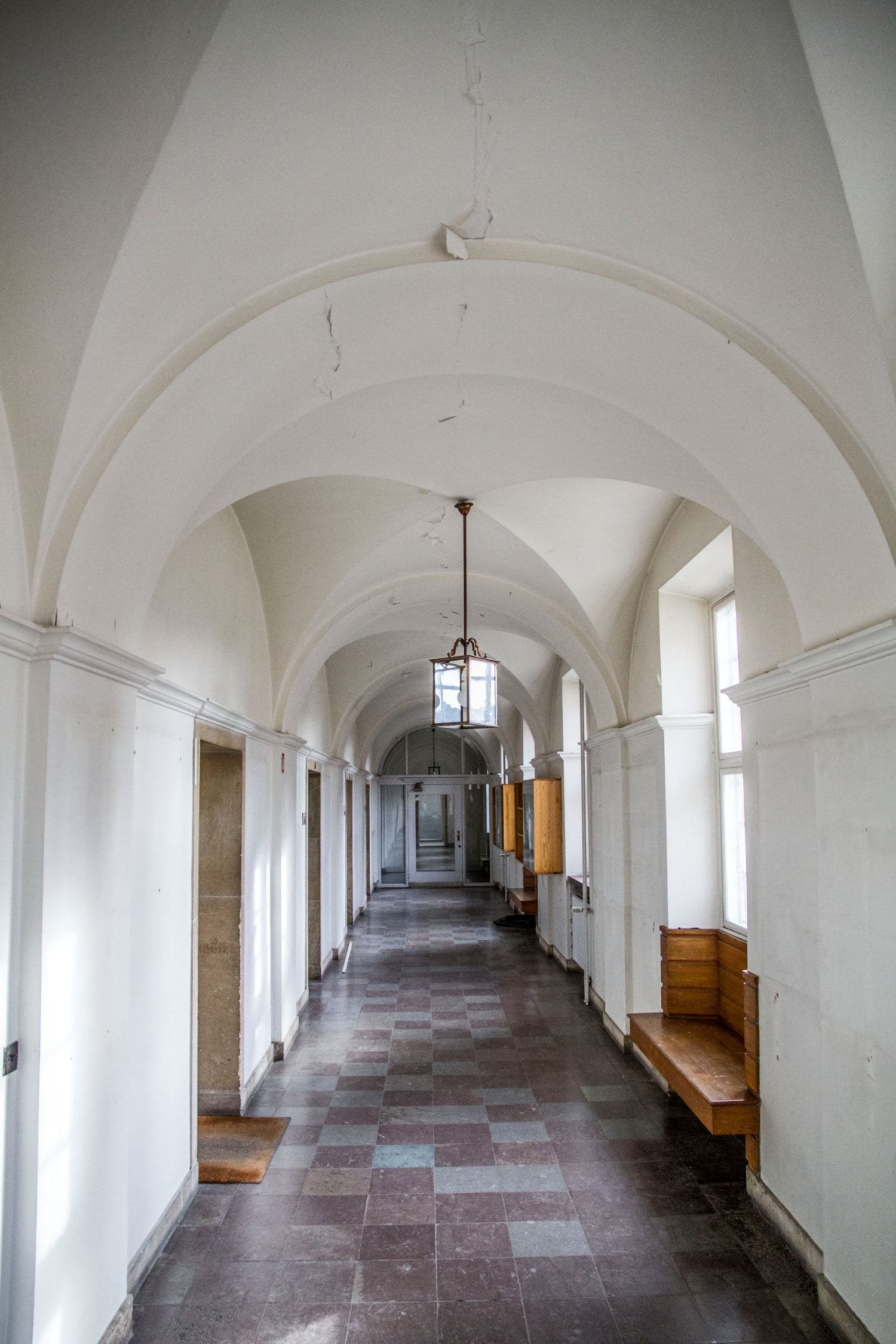 The vaulted corridor with its built-in oak bench