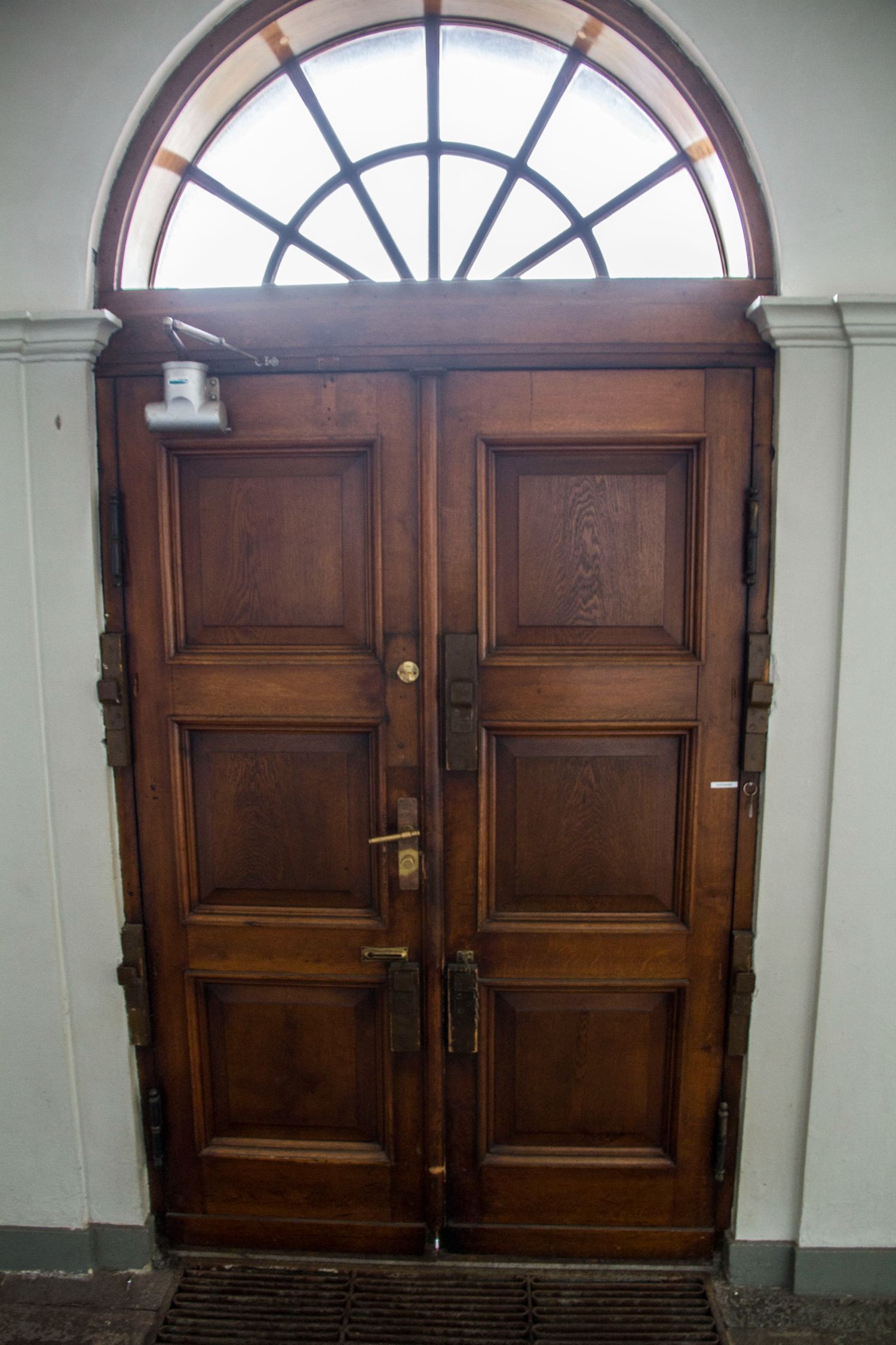 Oak door with a semicircular fanlight