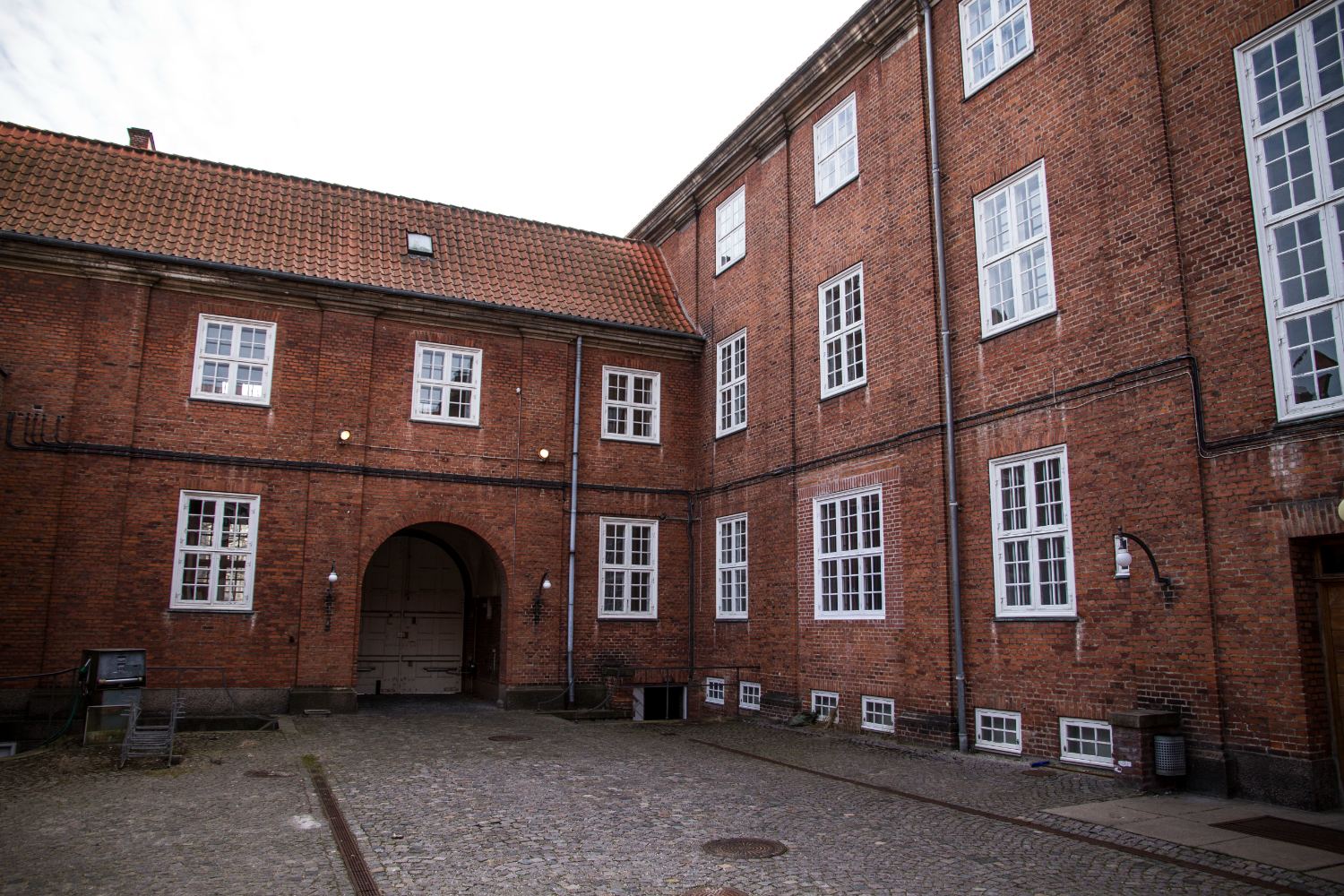 The courtyard with its round-arched gateway